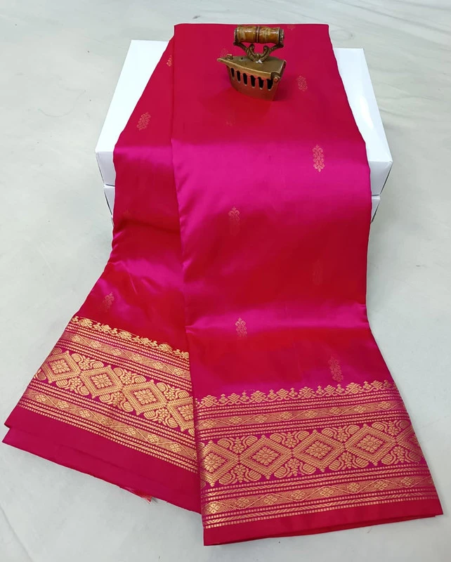 Rani traditional silk saree with zari border for festive and wedding wear