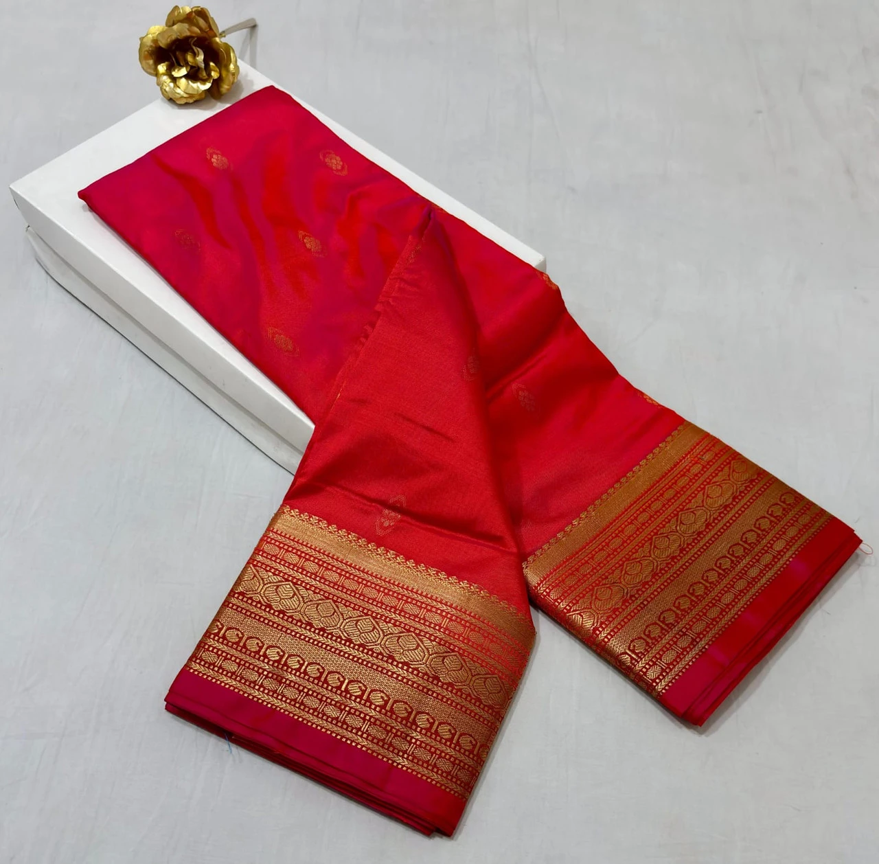 Rani Orange traditional silk saree with zari border for festive and wedding occasions