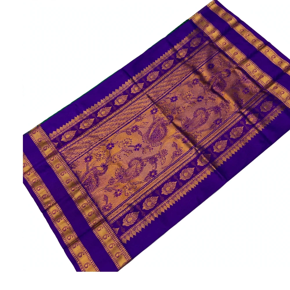 Orange silk saree with royal blue Bentex border and traditional paisley motifs.