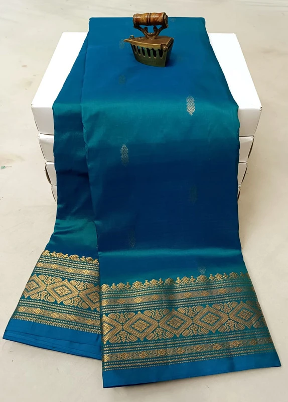 Blue traditional silk saree with zari border for festive and wedding occasions