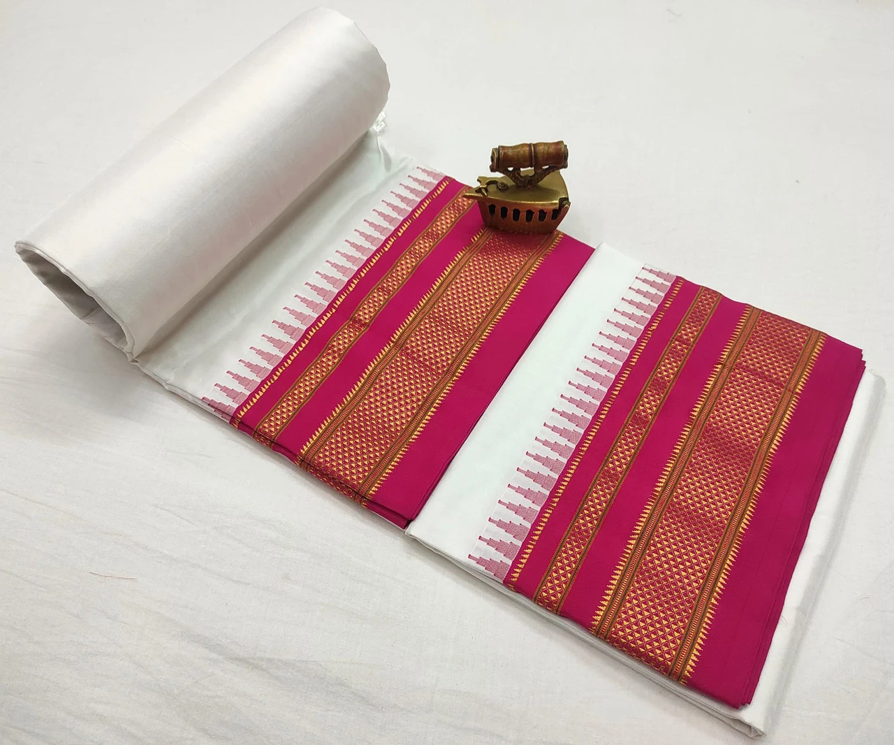 White Ilkaal plain pure saree with Pink zari border and traditional woven design