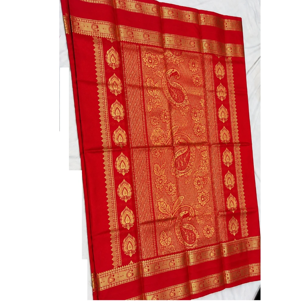 Green silk saree with red and gold Bentex border featuring paisley and temple motifs.