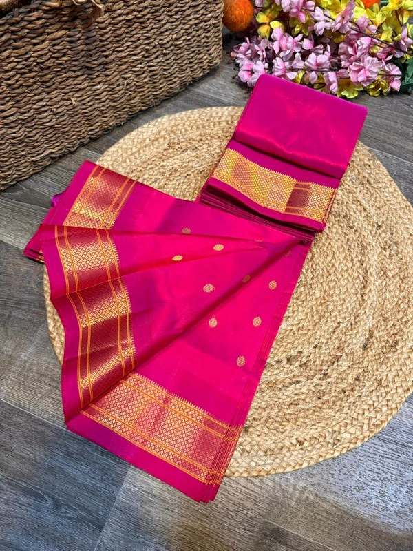 Exclusive Pink Paithani self color pure silk saree with gold zari border, traditional Meena butta weaving and handwoven craftsmanship.