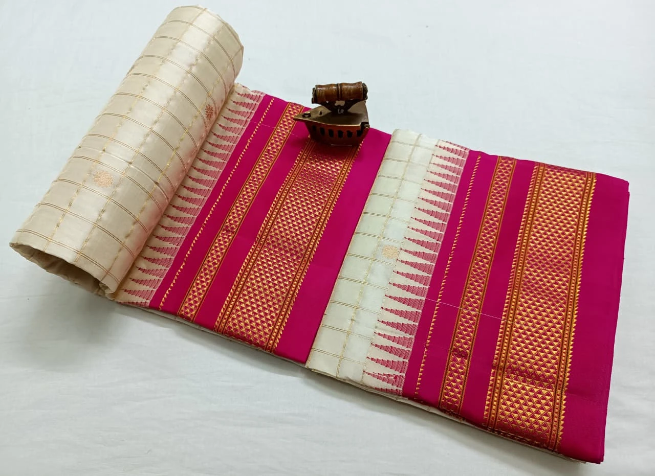 Pure Ilkaal Checks saree in Cream & Rani Pink with zari border and traditional woven patterns