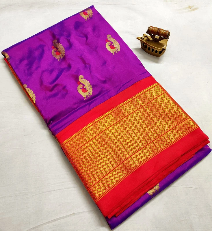 Magenta Pure Silk Paithani Saree featuring luxurious silk fabric, rich zari woven borders, elegant traditional motifs