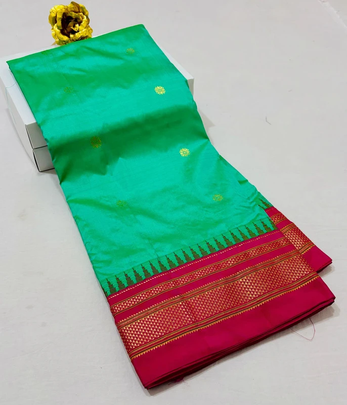 Sea Green pure Ilkaal Butta saree with Pink zari contrast border and traditional gold motifs