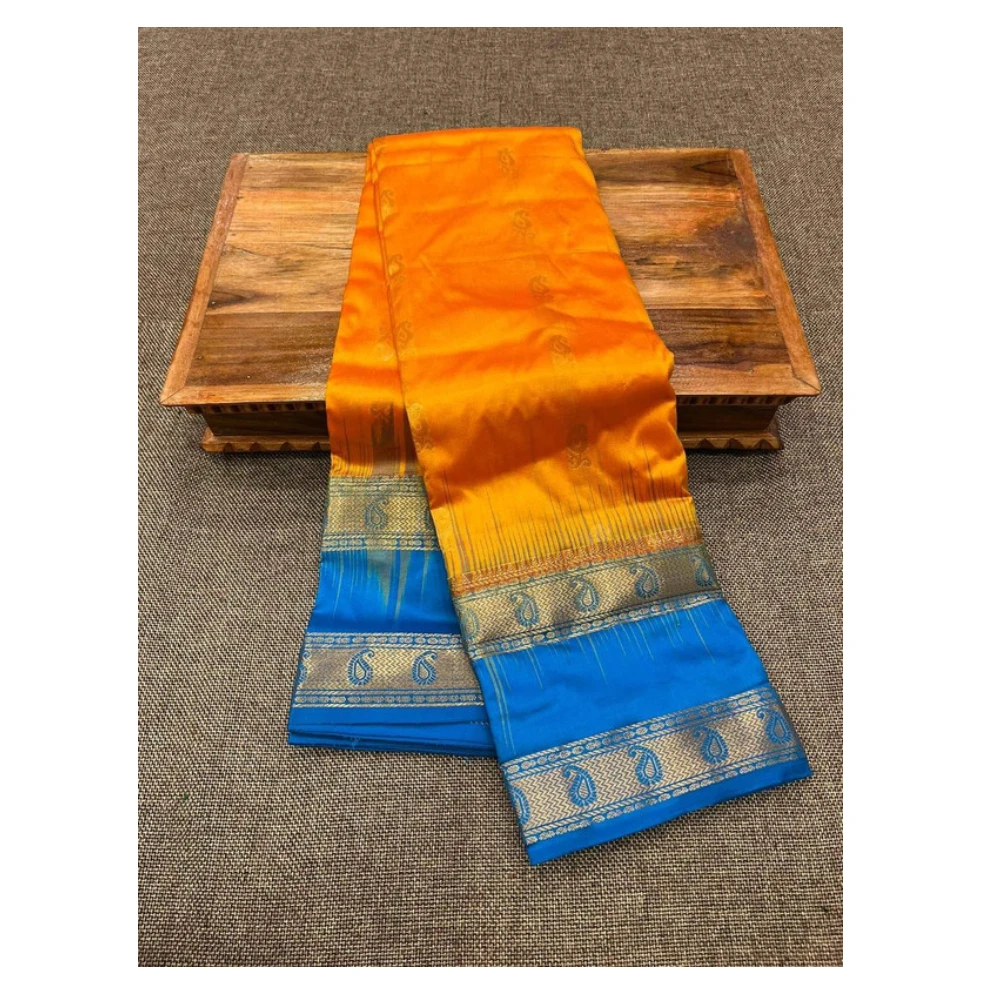 Orange silk saree with sky blue Bentex border and intricate paisley motifs.