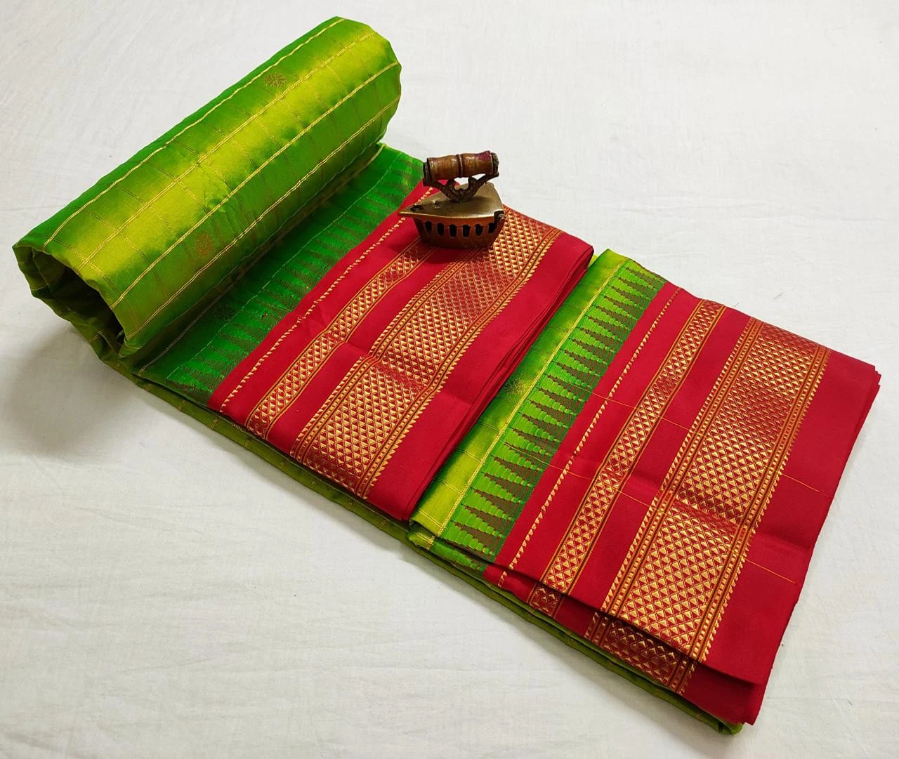 Pure Ilkaal Checks saree in Olive Green & Pink with zari border and traditional woven patterns