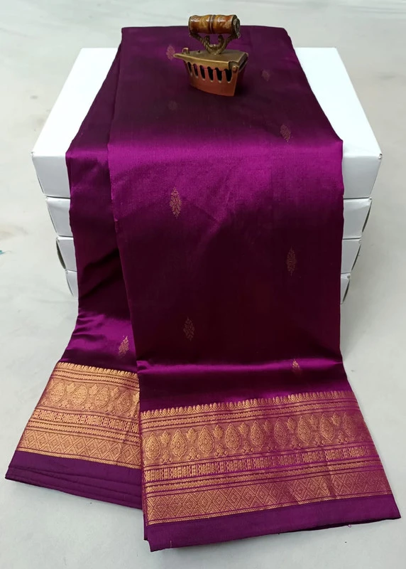 Dark Purple traditional silk saree with zari border for festive and wedding occasions