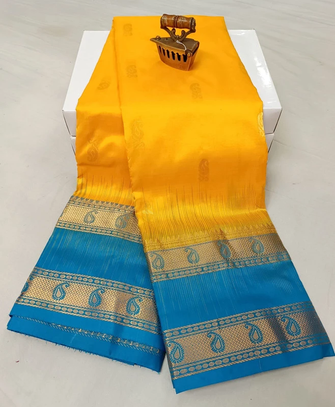 Yellow and Blue Kanchipuram silk saree with Bentex border and golden motifs