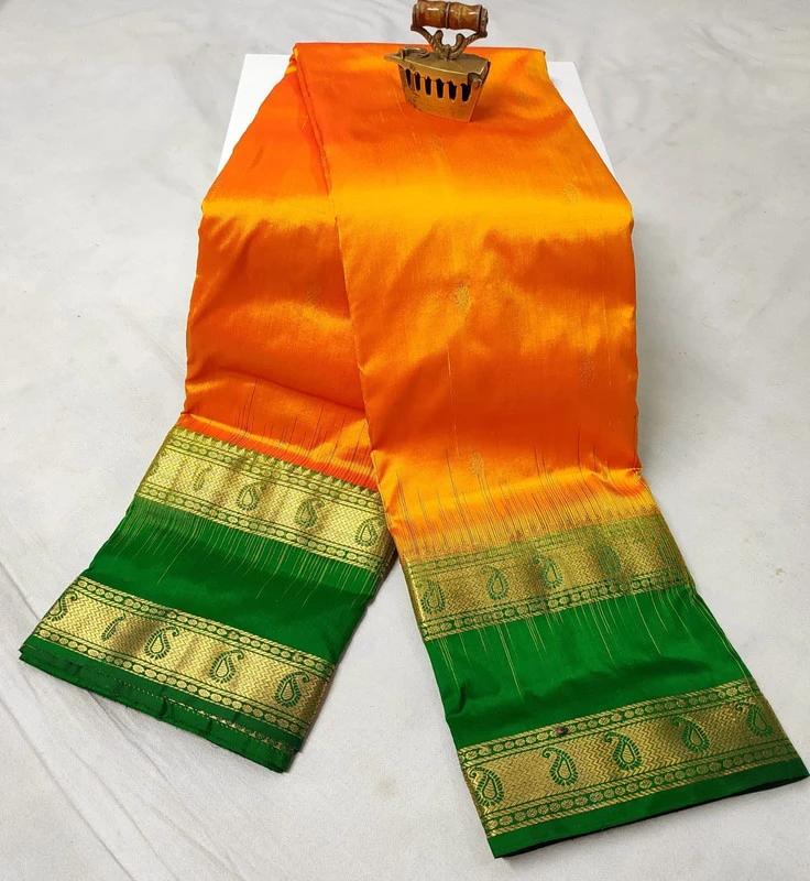 Orange and Green Kanchipuram silk saree with Bentex border and golden motifs