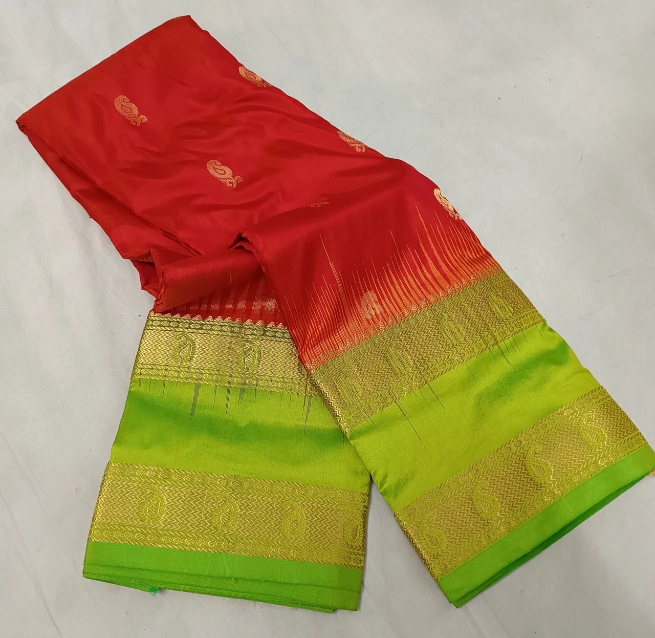 Red and Lime Green Kanchipuram silk saree with Bentex border and golden motifs