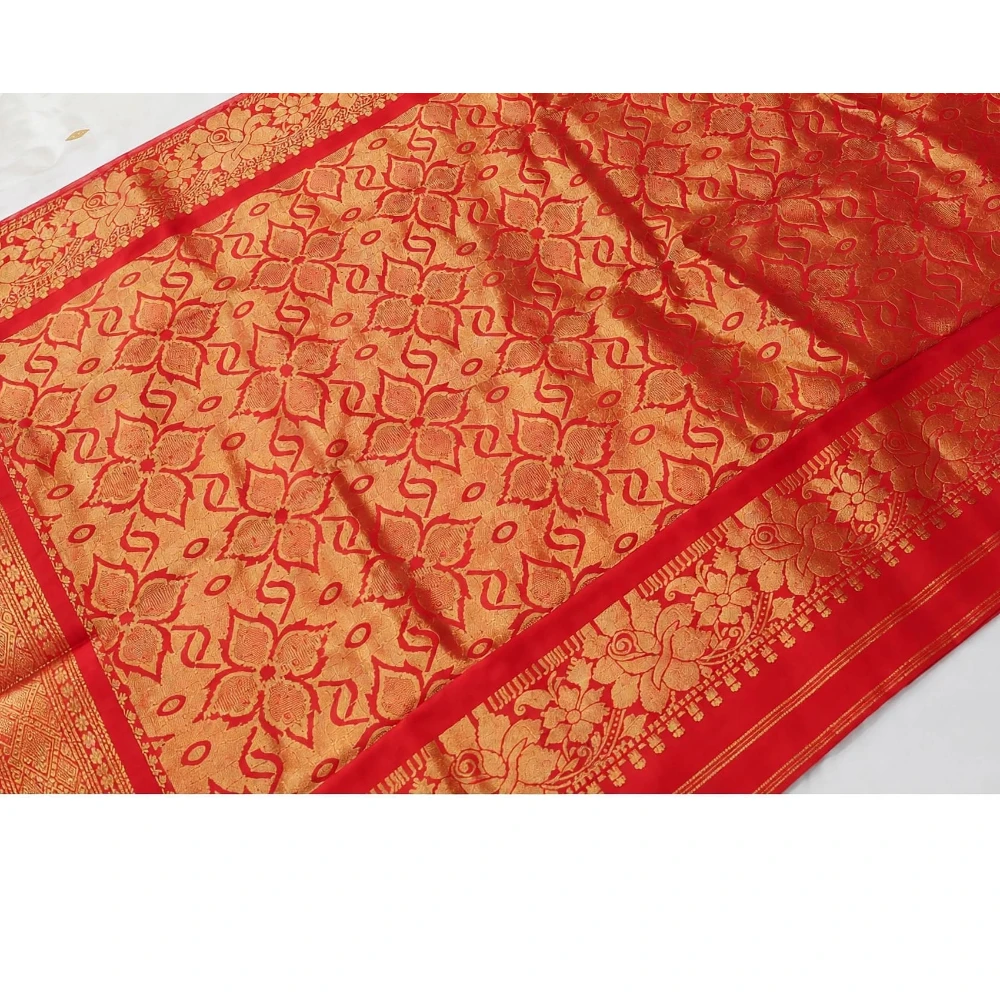 Red traditional silk saree with zari border for festive and wedding occasions