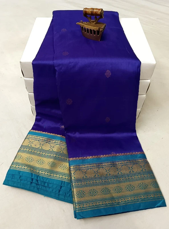 Peacock Blue traditional silk saree with zari border for wedding and festive wear