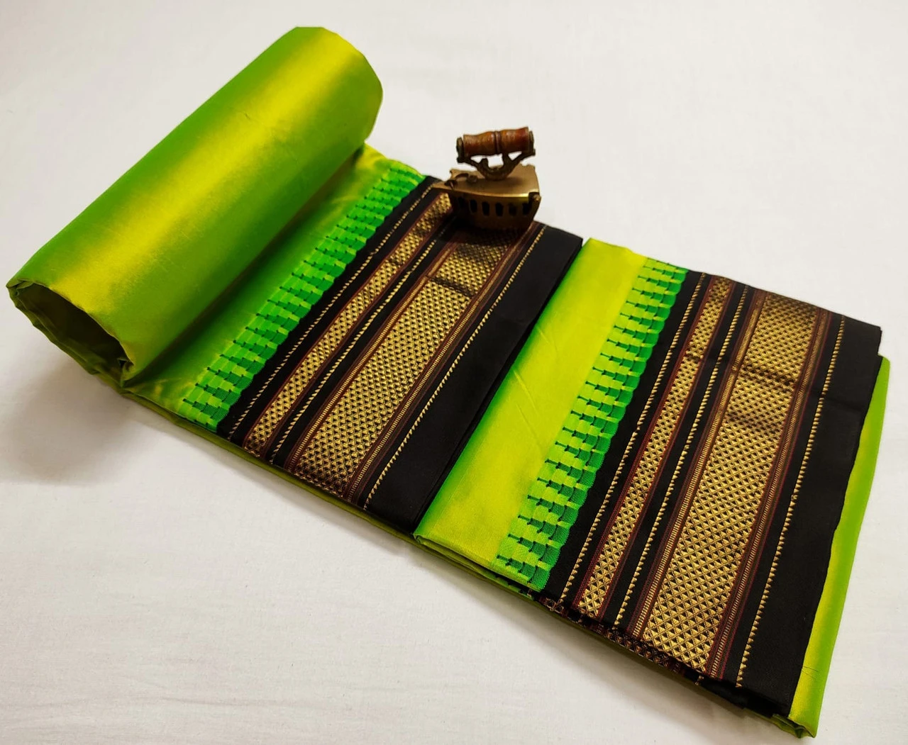 Sneha  Green Ilkaal plain pure saree with black contrast zari border traditional handloom design