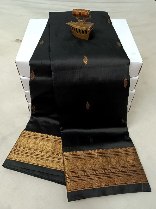 Black traditional silk saree with zari border for festive and wedding wear