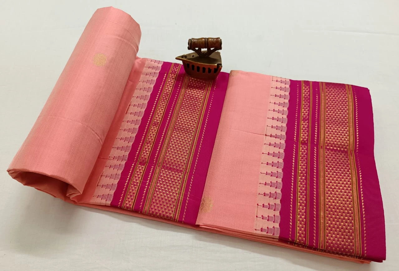 Orange Ilkaal Butta pure silk saree with zari border and traditional woven patterns