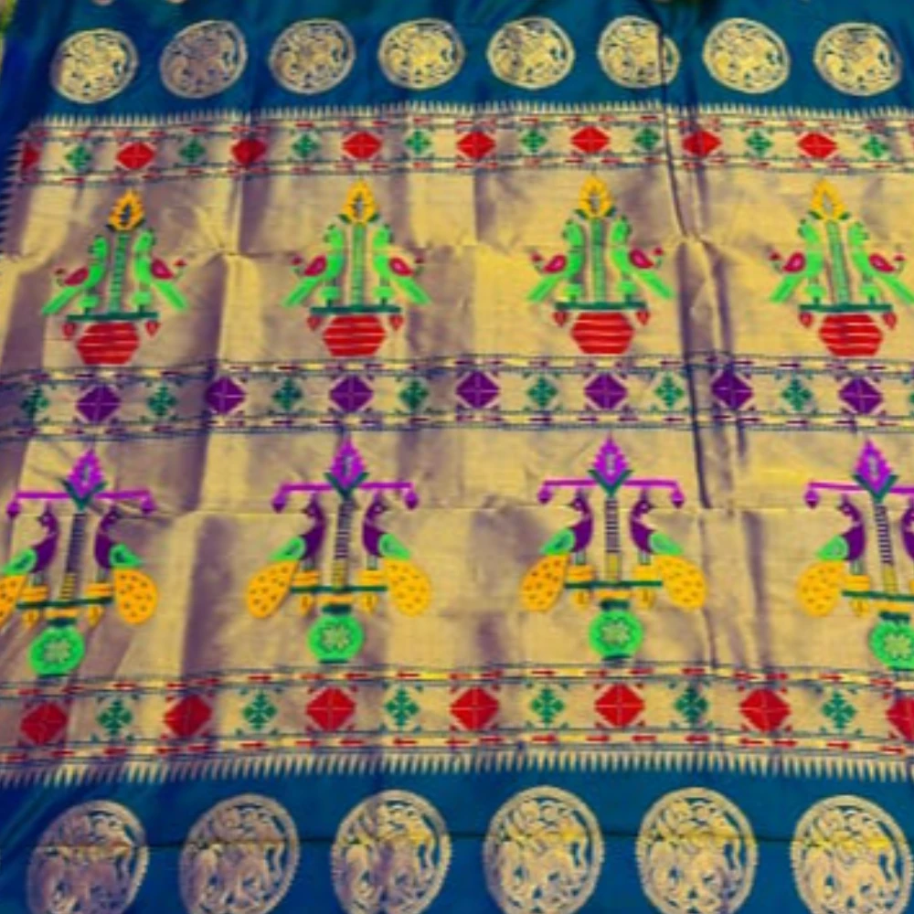 Exclusive Deep Purple Paithani self color pure silk saree with gold zari border, traditional Meena butta weaving and handwoven craftsmanship.