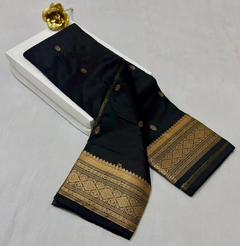 Black traditional silk saree with zari border for festive and wedding wear