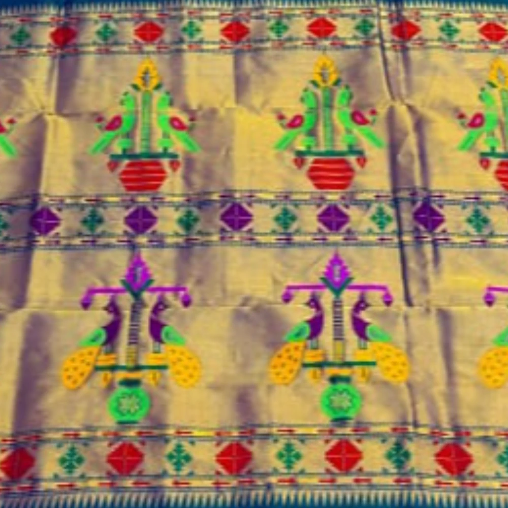 Exclusive Turquoise Blue Paithani self color pure silk saree with gold zari border, traditional Meena butta weaving and handwoven craftsmanship.