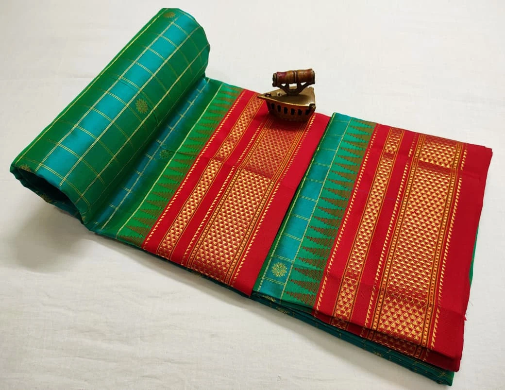 Pure Ilkaal Checks saree in Rama Green with zari border and traditional woven patterns