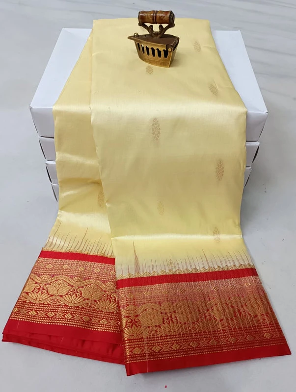 Off whie Rani traditional silk saree with zari border for festive and wedding occasions