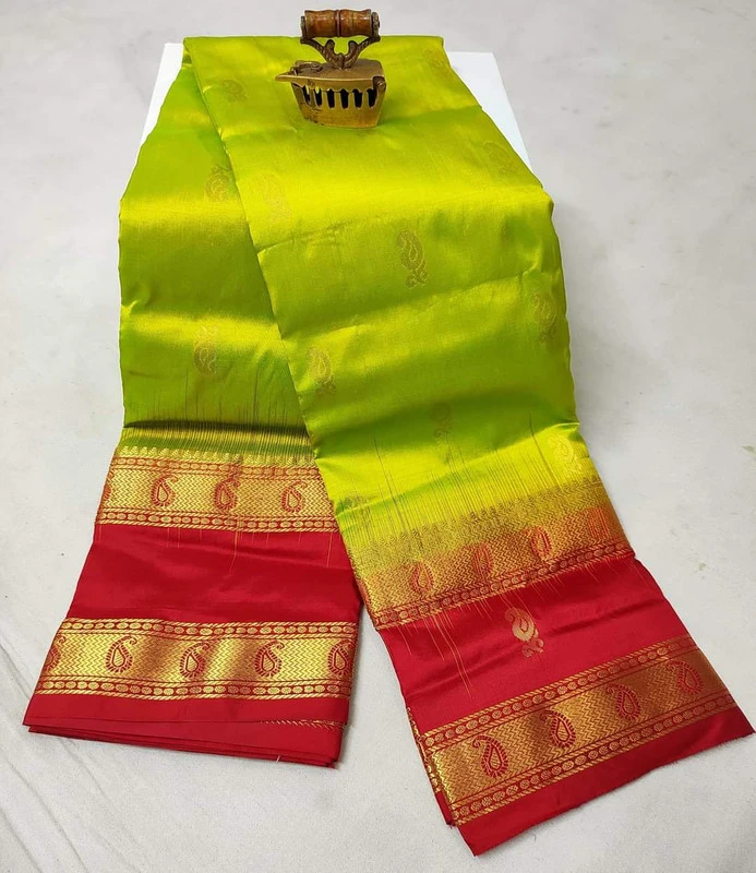 Yellow-green Kanchipuram silk saree with red and gold Bentex border.