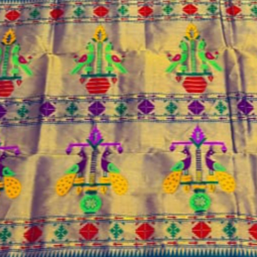 Exclusive Red Paithani self color pure silk saree with gold zari border, traditional Meena butta weaving and handwoven craftsmanship.