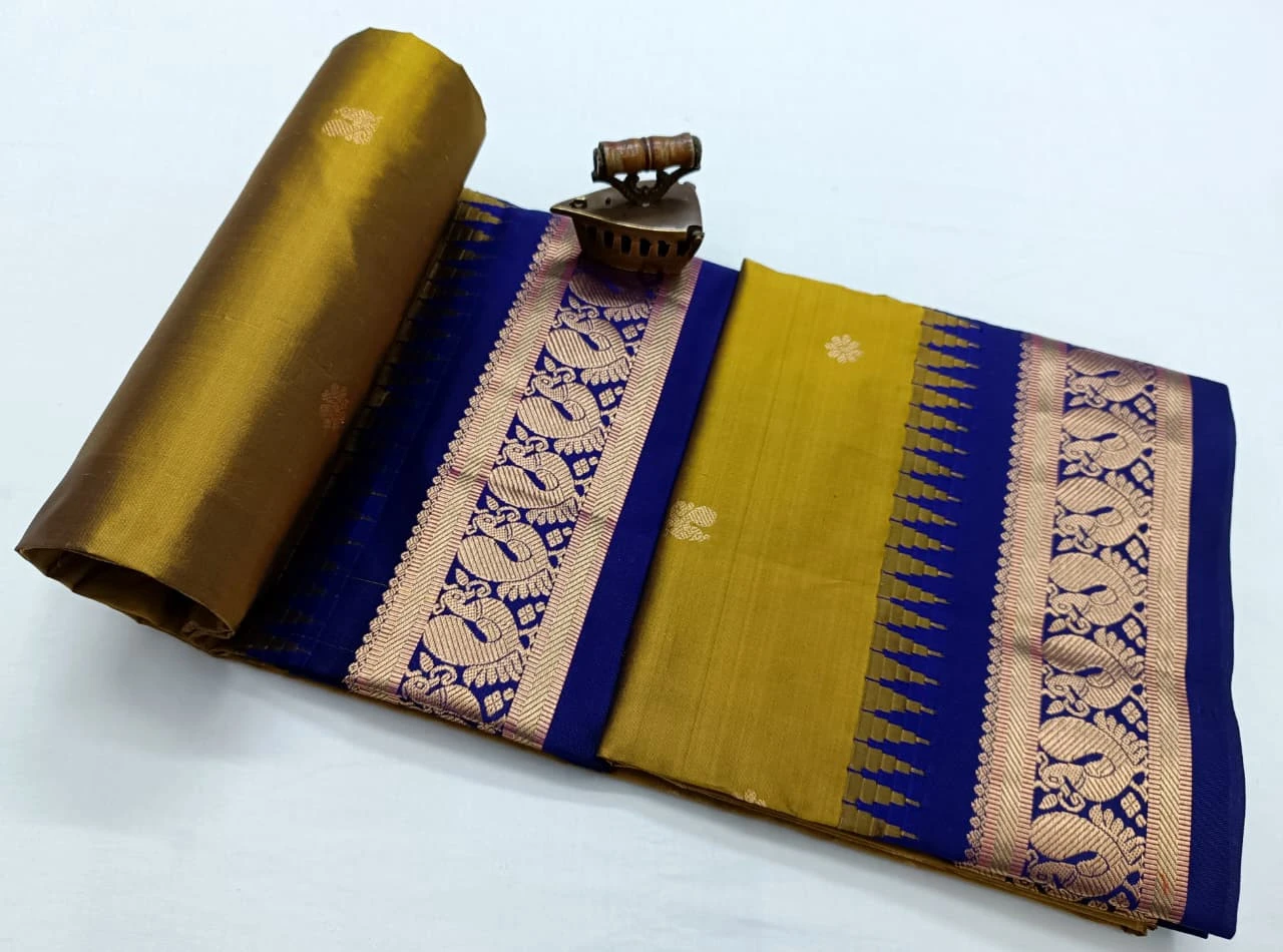 Gold with Violet Contrast Gadwal traditional silk saree with zari border for festive and wedding occasions