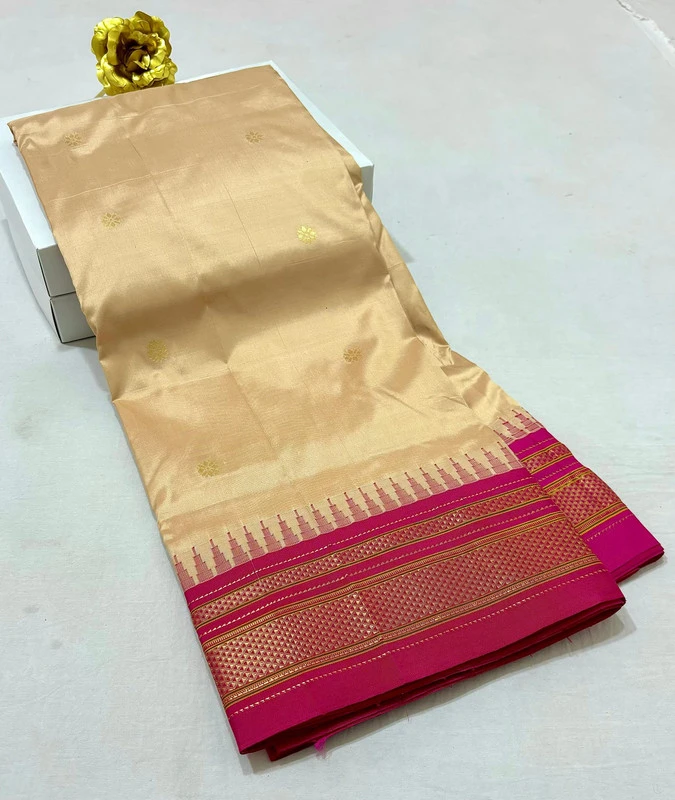 Beige Gold pure Ilkaal Butta saree with Pink zari contrast border and traditional gold motifs