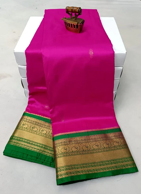 Rani and Green Contrast traditional silk saree with zari border for festive and wedding wear