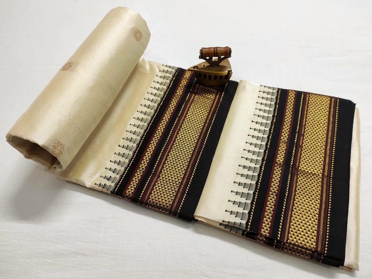 Cream Ilkaal Butta pure silk saree with zari border and traditional woven patterns