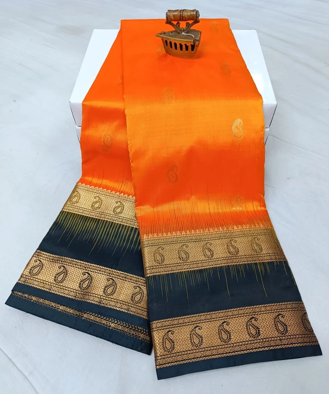 Orange and Black Kanchipuram silk saree with Bentex border and golden motifs