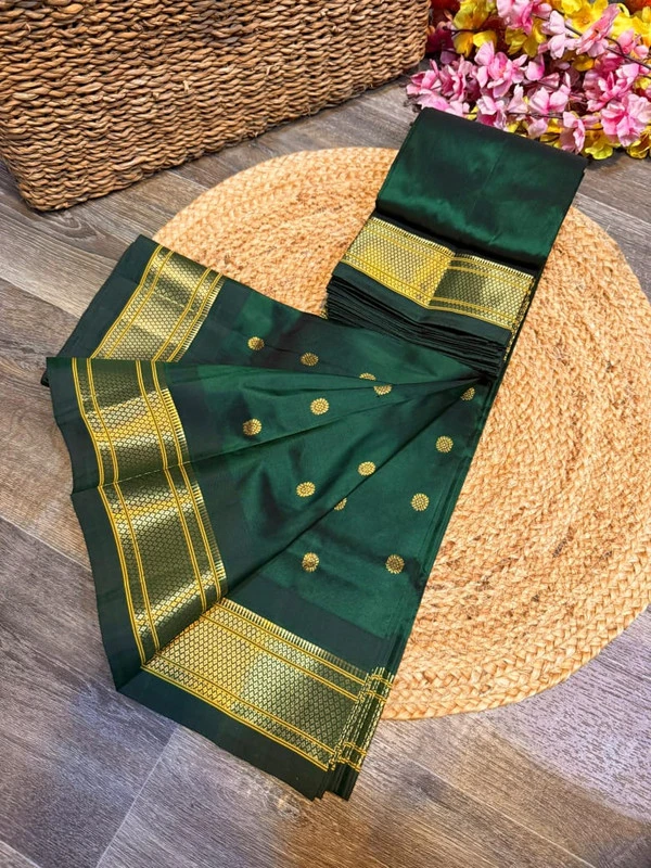Exclusive Copper Green Paithani self color pure silk saree with gold zari border, traditional Meena butta weaving and handwoven craftsmanship.