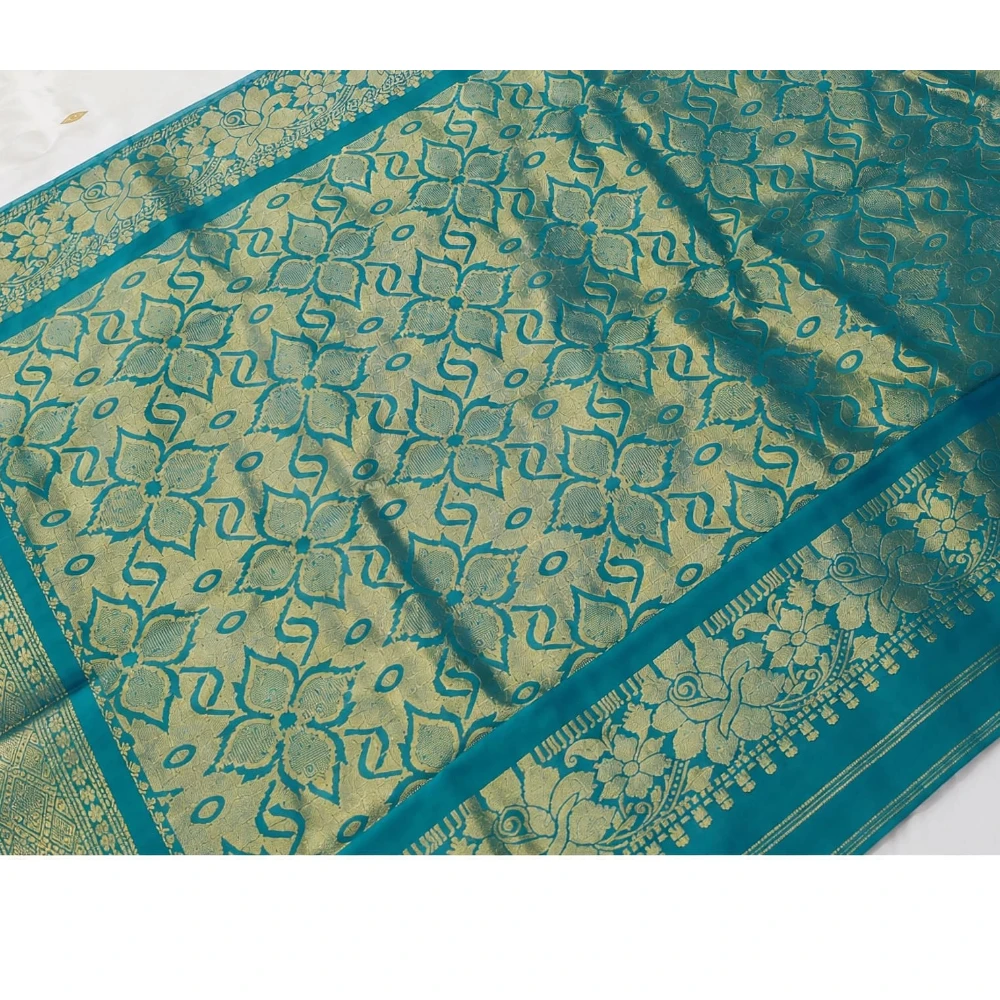Emerald Green traditional silk saree with zari border for festive and wedding occasions
