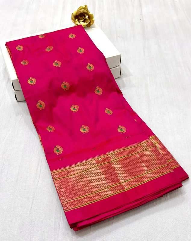 Exclusive Hot Pink Paithani self color pure silk saree with gold zari border, traditional Meena butta weaving and handwoven craftsmanship.