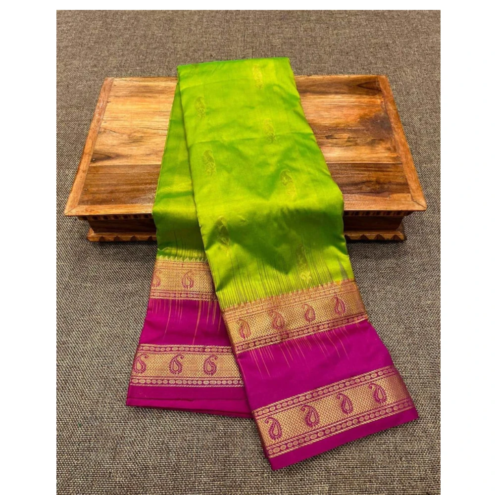 Lime-green silk saree with Rani Bentex border and gold paisley accents.