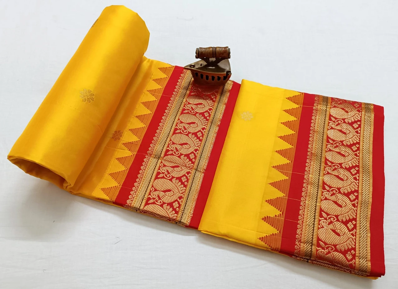 Golden Yellow with Red Contrast Gadwal traditional silk saree with zari border for festive and wedding occasions