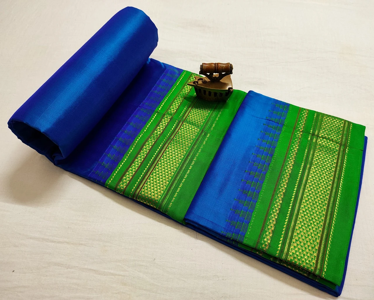 Royal Blue Ilkaal plain pure saree with Green zari border and traditional woven design