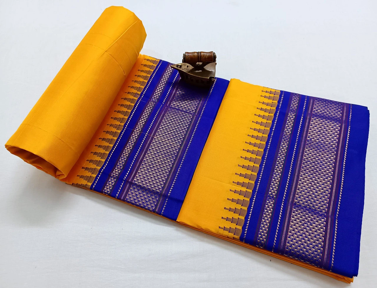 Yellow Ilkaal plain pure saree with Royal Blue zari border and traditional woven design