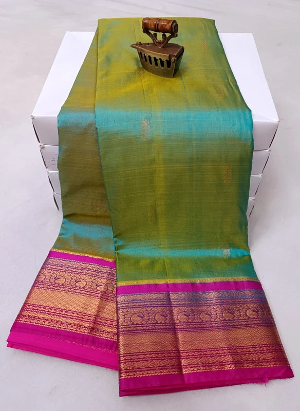 Lite Green traditional silk saree with zari border for festive and wedding occasions