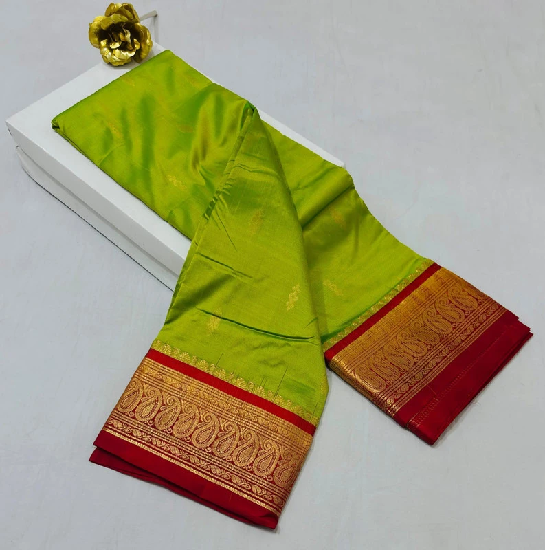 Sneha green with Red Contrast traditional silk saree with zari border for festive and wedding wear