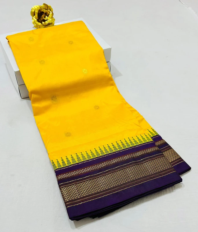 Yellow Ilkaal Butta pure silk saree with zari border and traditional woven patterns