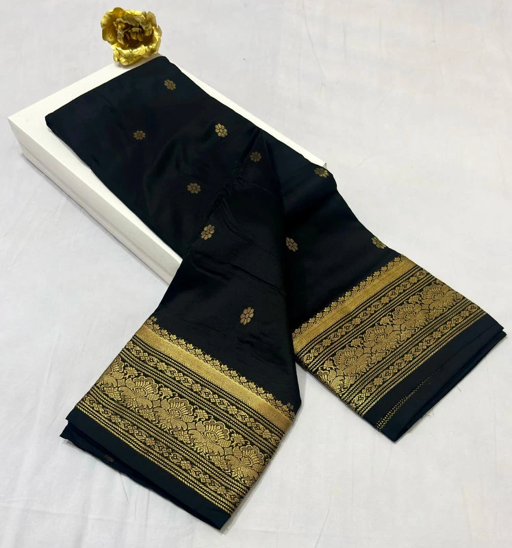 Black traditional silk saree with zari border for festive and wedding wear