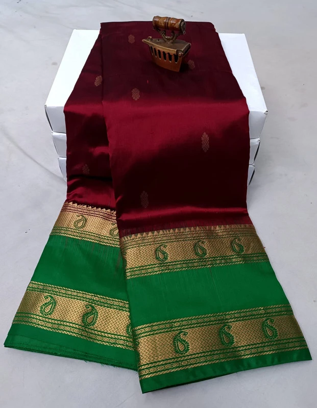 Wine and Green Kanchipuram silk saree with Bentex border and golden motifs