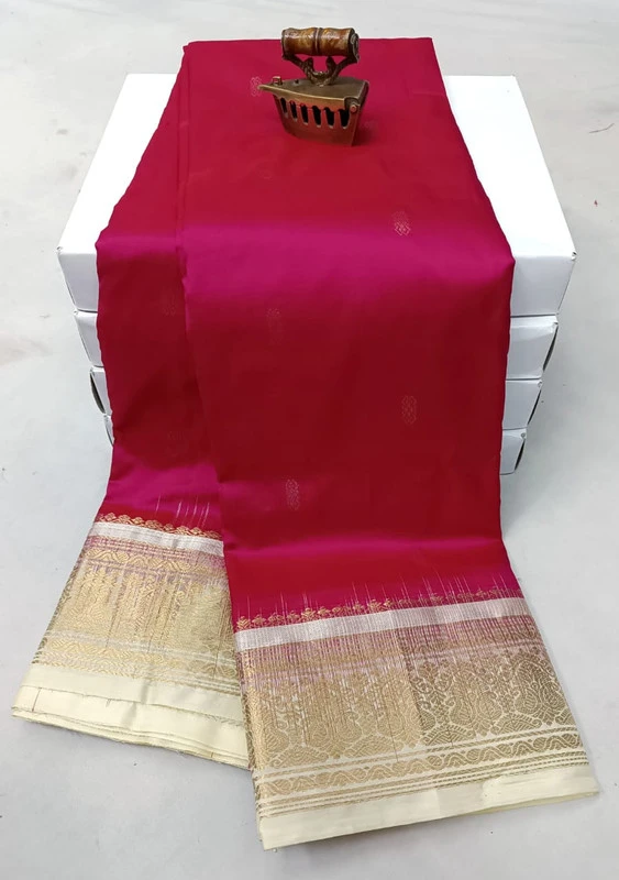 Rani with white contrast traditional silk saree with zari border for festive and wedding wear