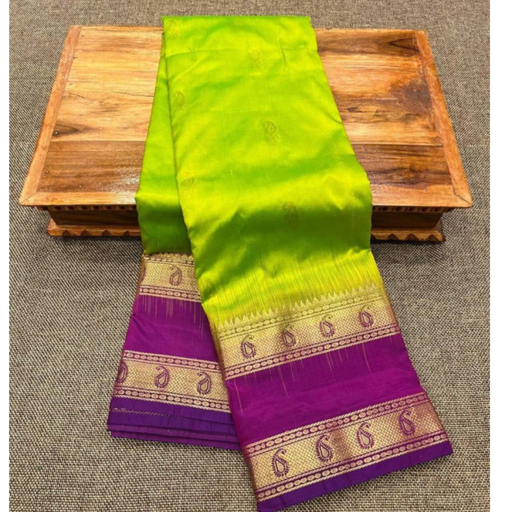 Lime green silk saree with magenta Bentex border and woven gold paisley motifs.