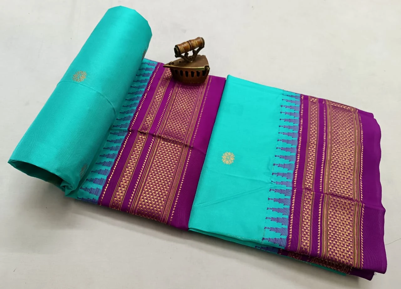 Aqua Purple Ilkaal Butta pure silk saree with zari border and traditional weaving