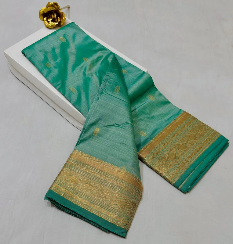 Teal Green traditional silk saree with zari border for wedding and festive wear
