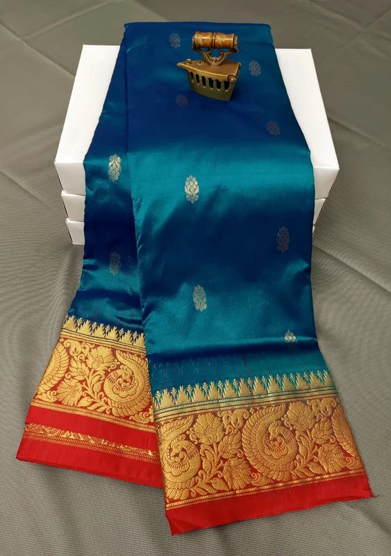 Peacock Blue Red Border Exclusive Kanchipuram Silk Saree